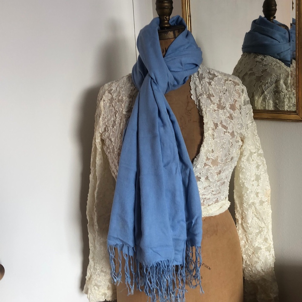 Light blue scarf with fringe. Soft blend fabric